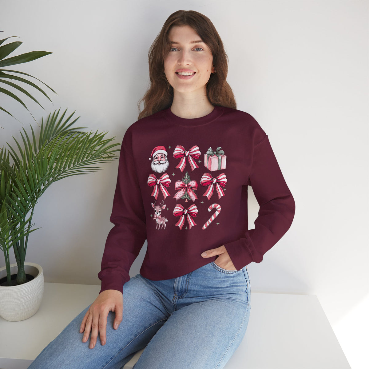 Pink Christmas bows and icons Crewneck Sweatshirt | Santa, reindeer, candy cane