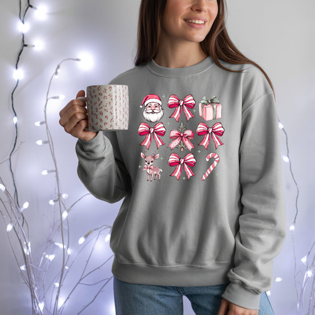 Pink Christmas bows and icons Crewneck Sweatshirt | Santa, reindeer, candy cane