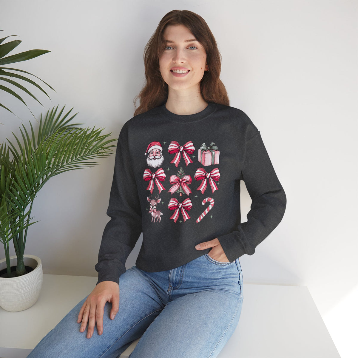 Pink Christmas bows and icons Crewneck Sweatshirt | Santa, reindeer, candy cane